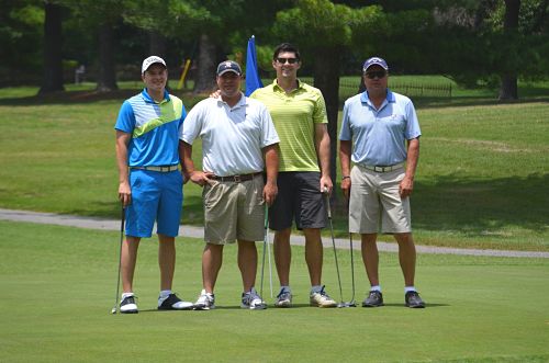 Picture of four male golfers outside on a golf course.(Chuck Genesio, Kalin Bridges, Jason Furlow and Jordan Campanella)