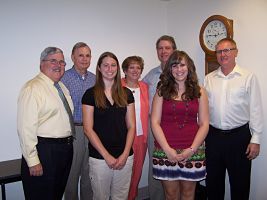 Pictured are: Front Row (L to R)- William Huff, CEO; Chelsey Varner (2009 Winner); Lindsey Chapman (2010 Winner); Don Hoffman.  Second row - Richard Haines, Kathy West and Mark Maclin