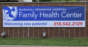 Marshall Browning Family Health CenterPicture of a Banner hanging outside The Hospital that says: 
MARSHALL BROWNING HOSPITAL
FAMILY HEALTH CENTER
Welcoming new patients! 618.542.2129